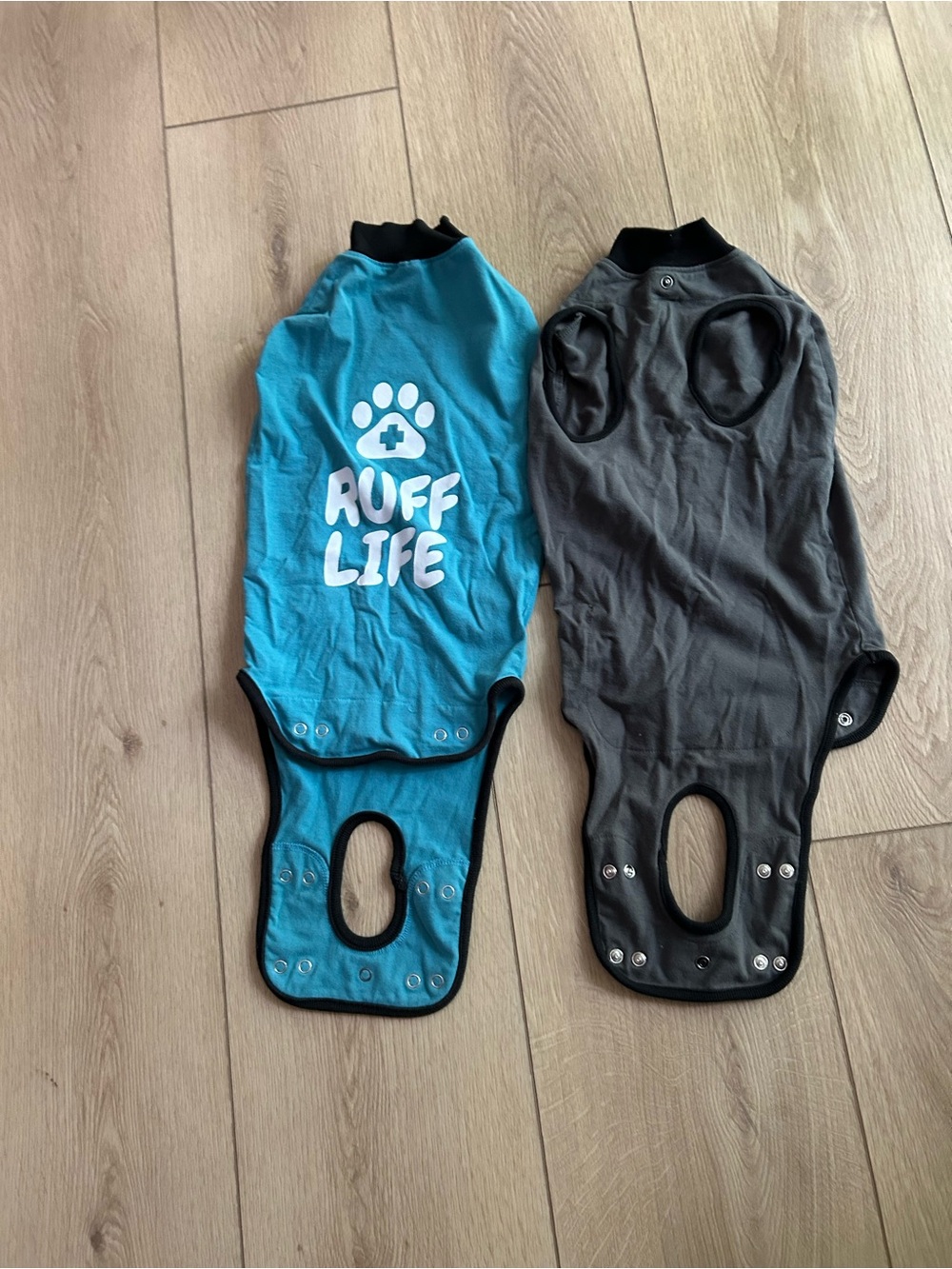 Two Ruff Life surgical suits